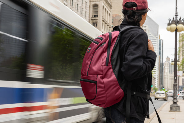 Person standing in downtown Seattle wearing a Raspberry Synapse 25.